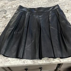 Leather pleated mini skirt